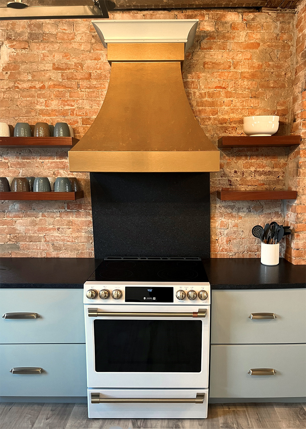 GE Cafe Stove and Oven A kitchen designed with GE Café Appliances